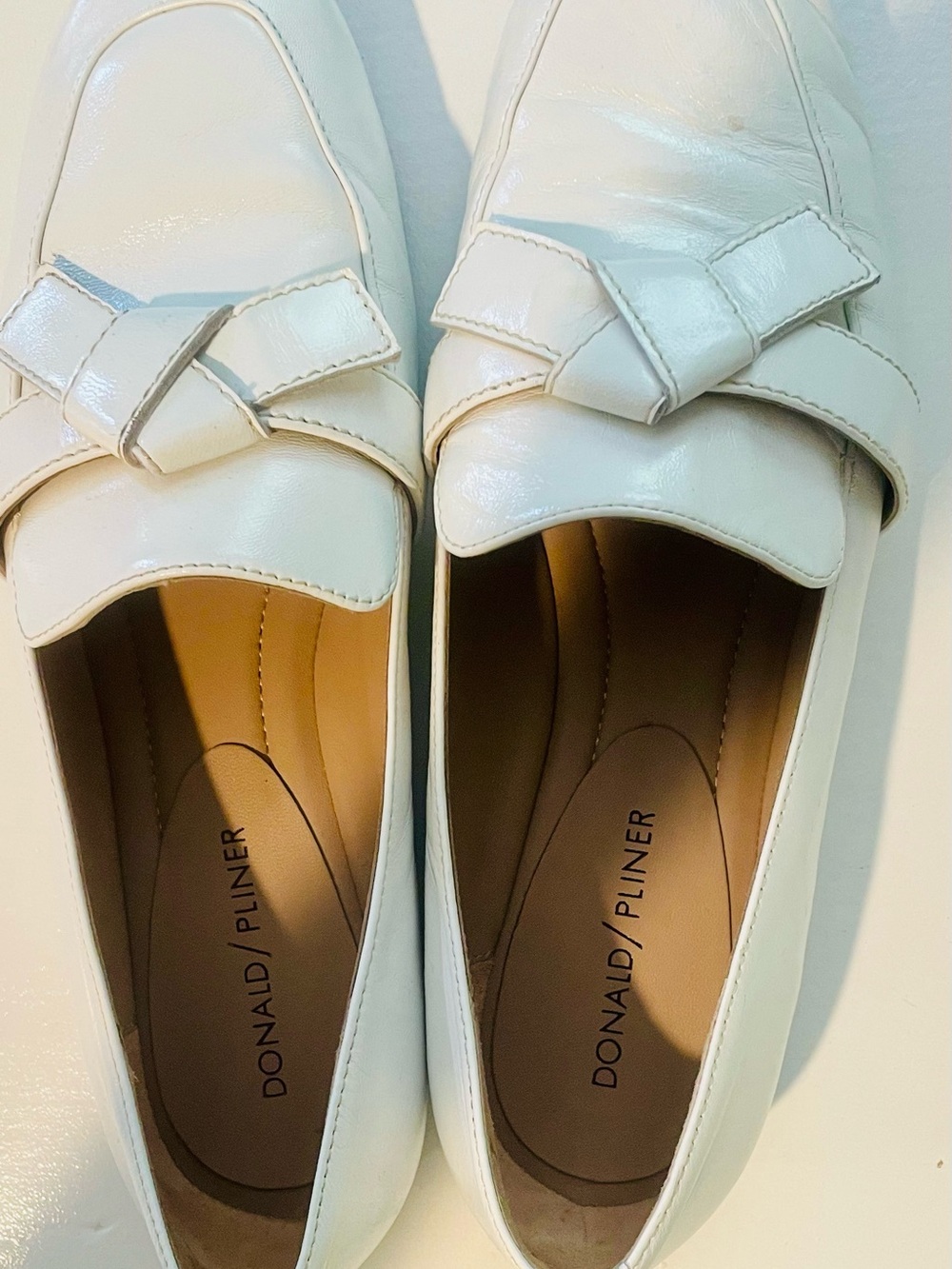 Donald J. Pliner White Patent Leather Loafers with Knot Detail